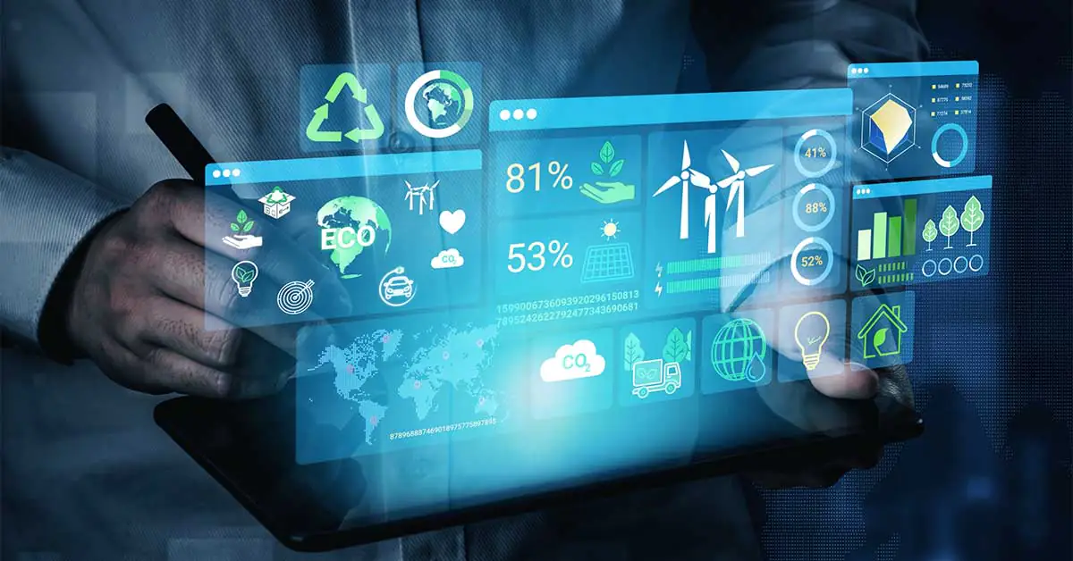 Hand using a stylus on a tablet beneath a holographic dashboard displaying energy data and analytics.